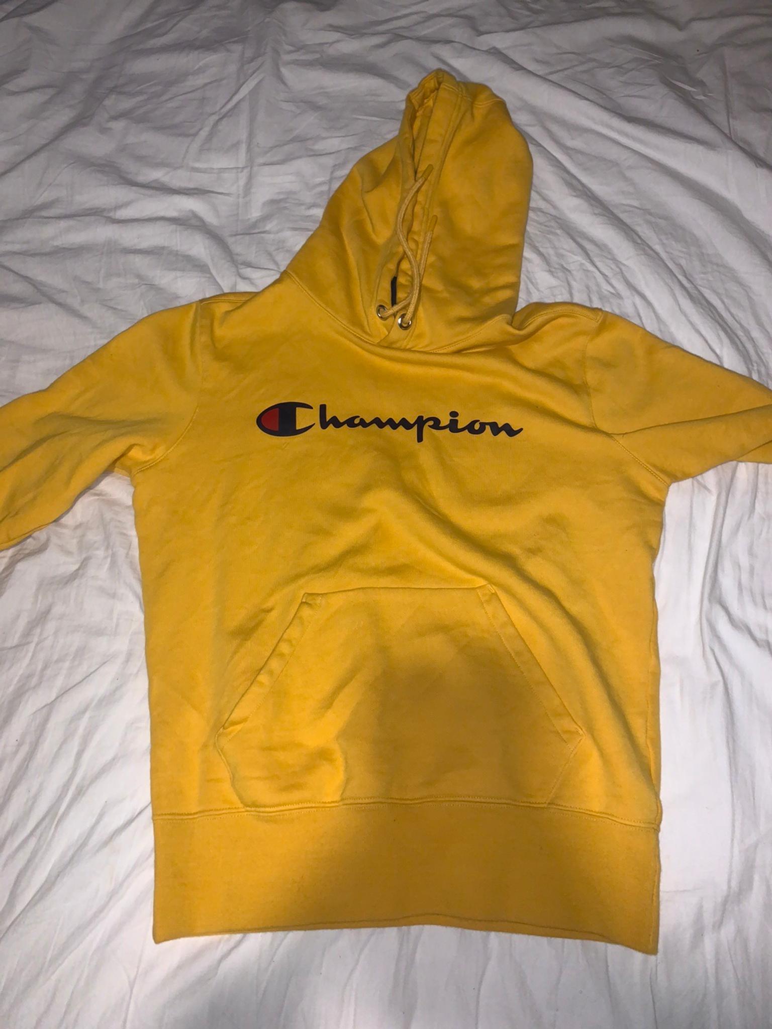 who bought champion clothing